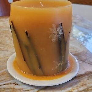 Decorative Orange Candle with Floral Design